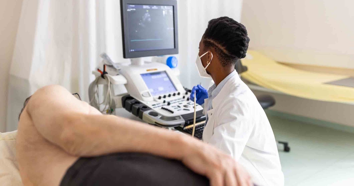 Imaging technician with patient Imaging technician with patient