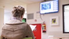 Person waiting in a waiting room Person waiting in a waiting room