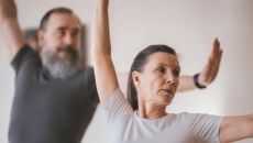 Two elderly people doing exercises Two elderly people doing exercises