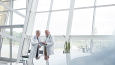 Healthcare professionals conferring  Healthcare professionals conferring