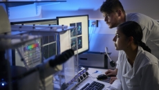 Healthcare professionals looking at telemetry Healthcare professionals looking at telemetry