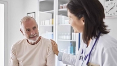 Patient with a doctor in the clinical setting Patient with a doctor in the clinical setting