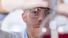 Technician working in a lab Technician working in a lab