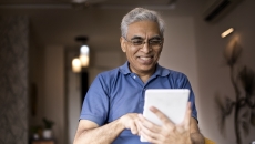 Patient using a tablet computer Patient using a tablet computer