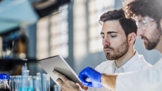Two lab technicians at work Two lab technicians at work