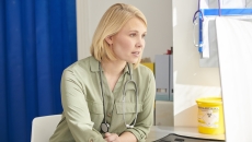 Healthcare provider sitting in a room