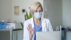 Healthcare provider on a computer Healthcare provider on a computer