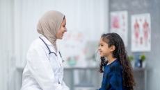 Two people sitting and discussing