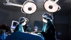 Doctors performing a surgical operation Doctors performing a surgical operation