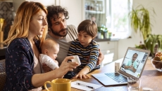 Photo of a family, mon, dad, two children Photo of a family, mon, dad, two children