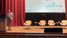 person presenting on stage person presenting on stage