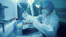 Technician working in a lab Technician working in a lab