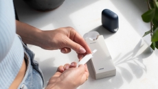 Also, British digital health startup Healum launches research network. Person holds a test strip. Healum, NHS, women's health