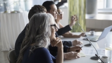 Executives gathered in a meeting