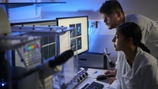 Healthcare professionals reviewing imaging on a PC Healthcare professionals reviewing imaging on a PC