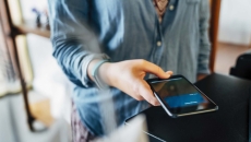 Person using their phone Person using their phone