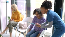 Healthcare worker filling out questionnaire Healthcare worker filling out questionnaire