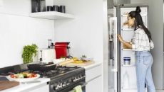 Person looking in a refrigerator Person looking in a refrigerator