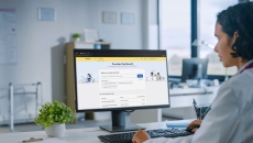 A doctor using Provider Mode on a desktop computer in her office. A doctor using Provider Mode on a desktop computer in her office.
