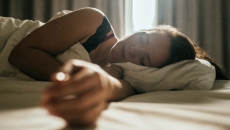 Someone sleeping in a bed Someone sleeping in a bed