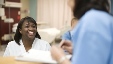 Healthcare professional engaging with patient Healthcare professional engaging with patient