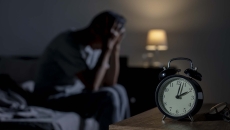 Person unable to sleep in the middle of the night Person unable to sleep in the middle of the night