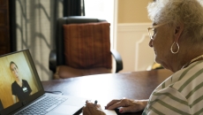 Healthcare professional consulting with a patient virtually Healthcare professional consulting with a patient virtually