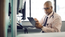 Healthcare professional with a tablet Healthcare professional with a tablet