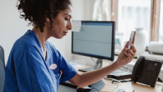 Physician on a telephone Physician on a telephone