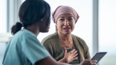 Healthcare professional consulting with a patient Healthcare professional consulting with a patient