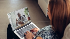 Patient consulting with healthcare professional virtually Patient consulting with healthcare professional virtually