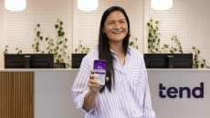 Olympian Valeria Adams showing the Tend Health app Olympian Valeria Adams showing the Tend Health app