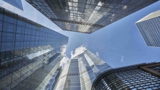 Photo looking up at the top of skyscrapers Photo looking up at the top of skyscrapers