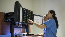 Clinicians using Philips' patient monitoring portal. Clinicians using Philips' patient monitoring portal.