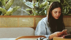 A young person using their smartphone A young person using their smartphone