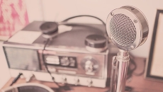 An old-timey microphone and radio setup represent our weekly digital health podcast