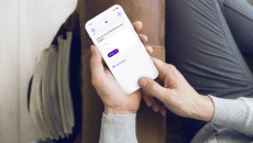 A close up of a person using Babylon's Symptom Checker on a smartphone A close up of a person using Babylon's Symptom Checker on a smartphone