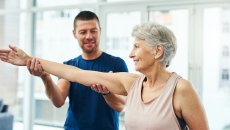 Caregiver exercising a care taker