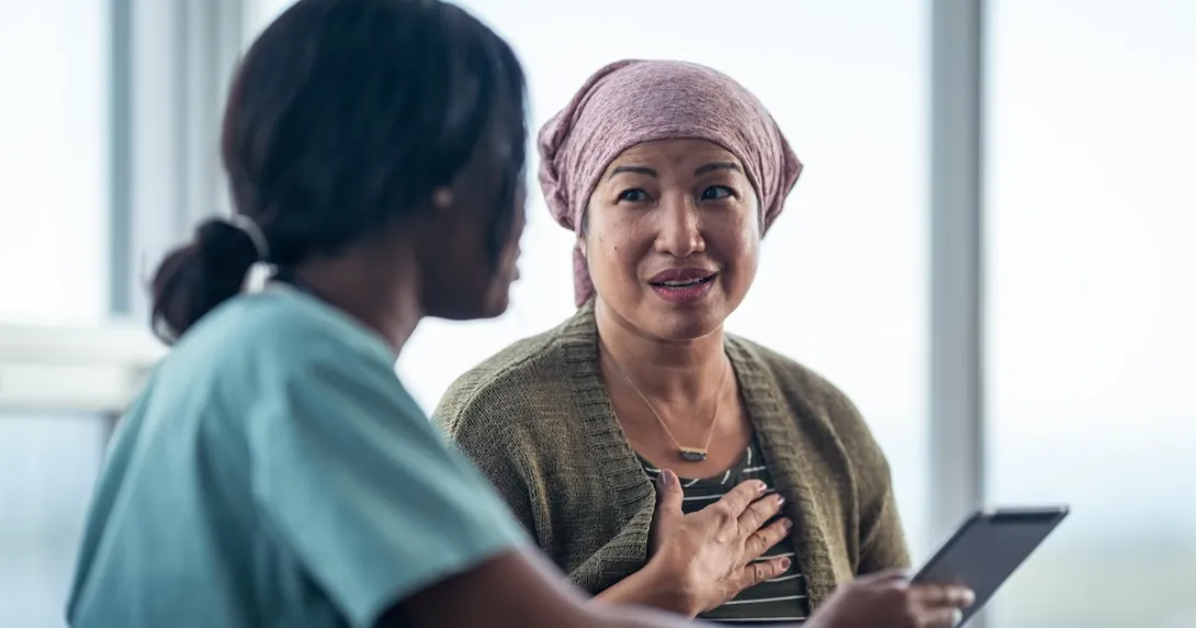 Healthcare professional talking to a patient Healthcare professional talking to a patient