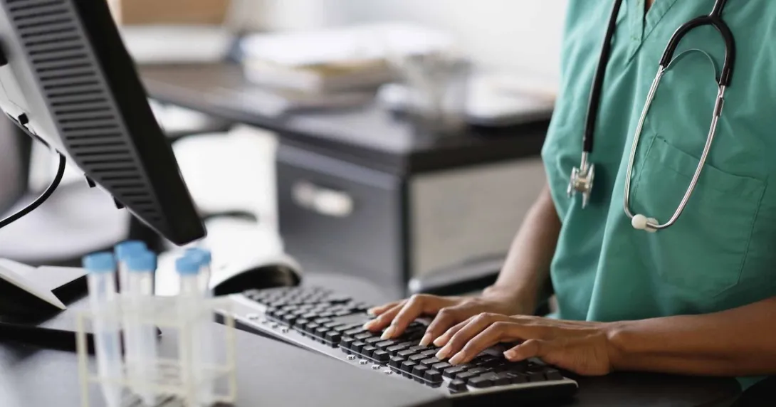 Nurse working at a computer