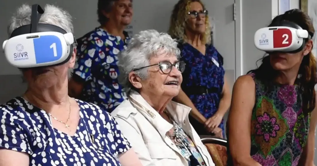 Aged care residents wearing VR headsets Aged care residents wearing VR headsets