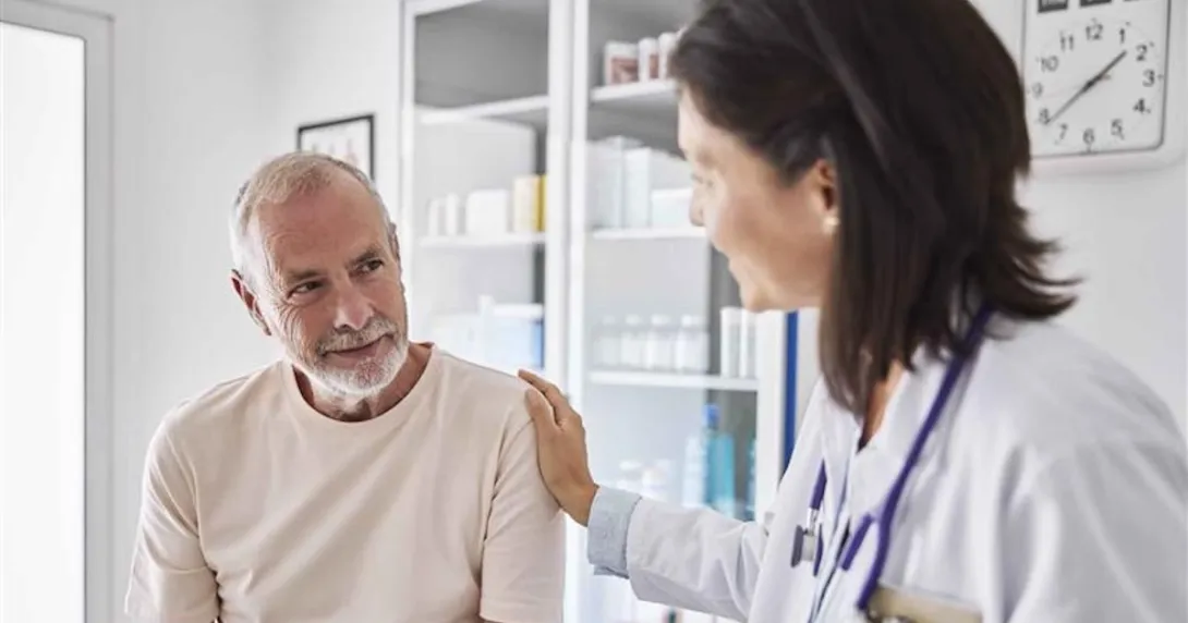 Patient with a doctor in the clinical setting Patient with a doctor in the clinical setting