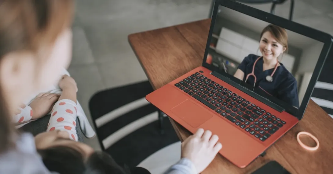 Healthcare professional engaging in telehealth visit with patient Healthcare professional engaging in telehealth visit with patient