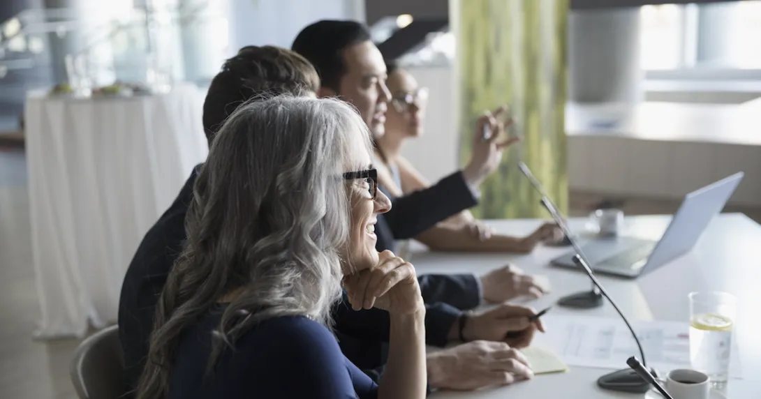 People sitting around a table People sitting around a table