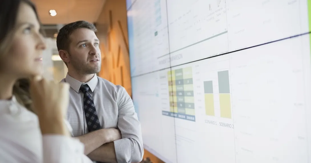 Executives reviewing data Executives reviewing data