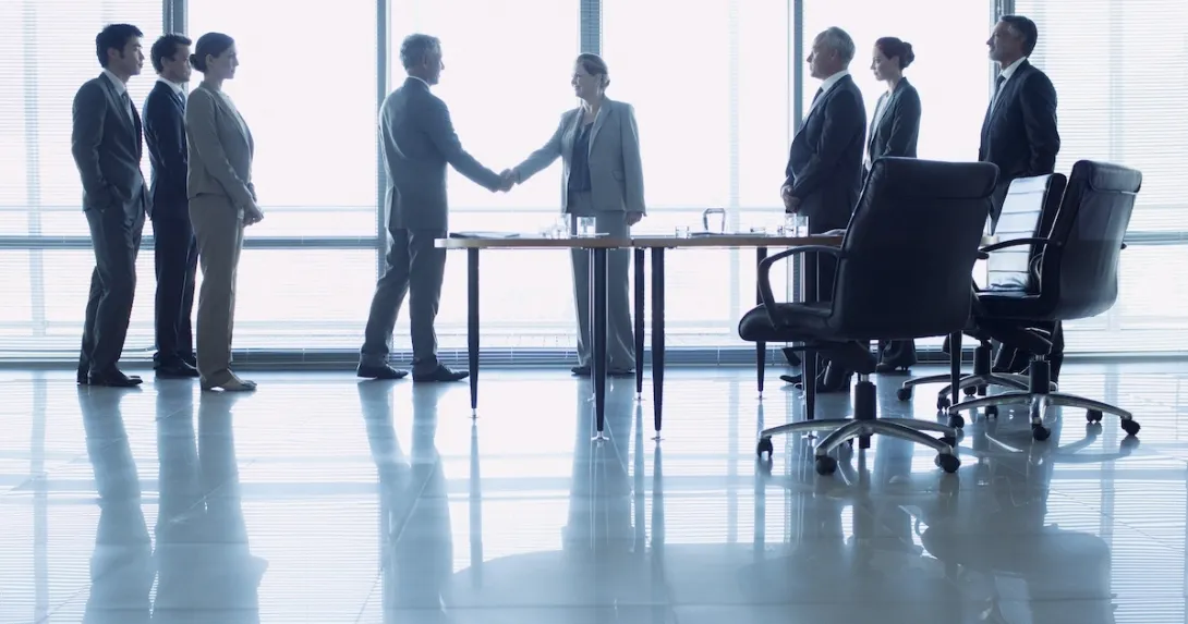 Executives discussing business deal Executives discussing business deal