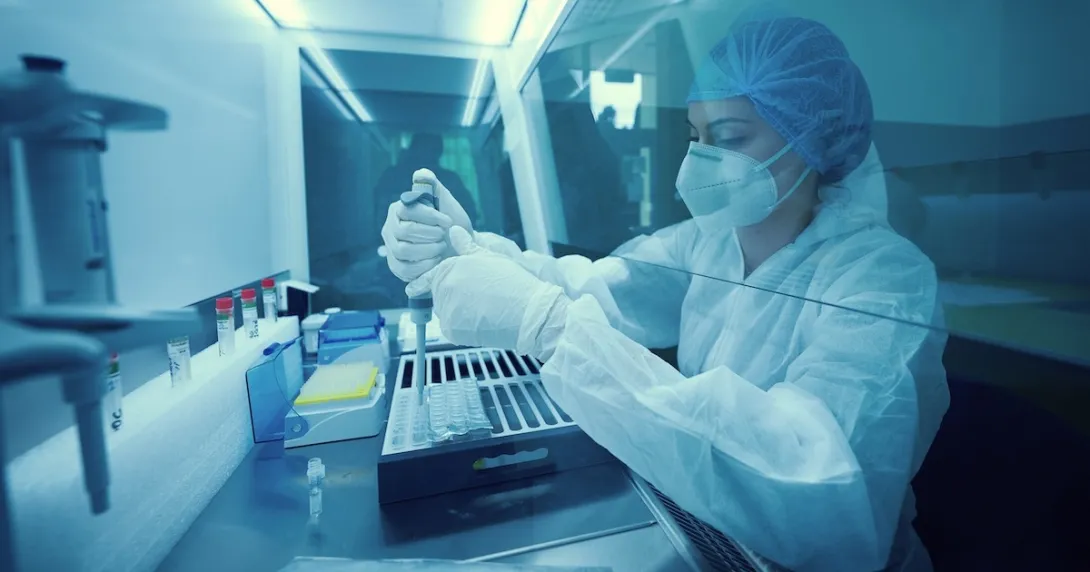 Technician working in a lab Technician working in a lab