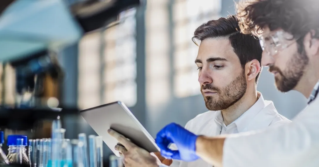Two lab technicians at work Two lab technicians at work