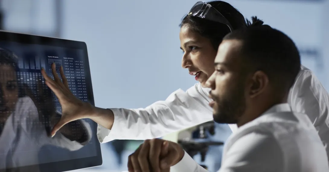 Healthcare professionals reviewing data on a PC Healthcare professionals reviewing data on a PC