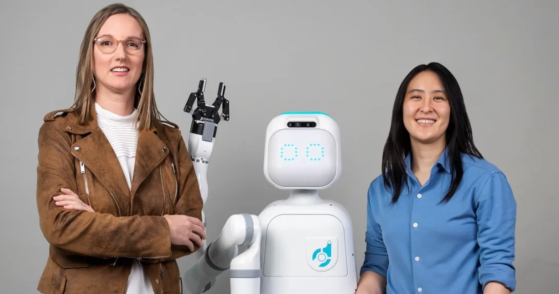 Diligent Robotics cofounders Andrea Thomaz and Vivian Chu with the Moxi robot